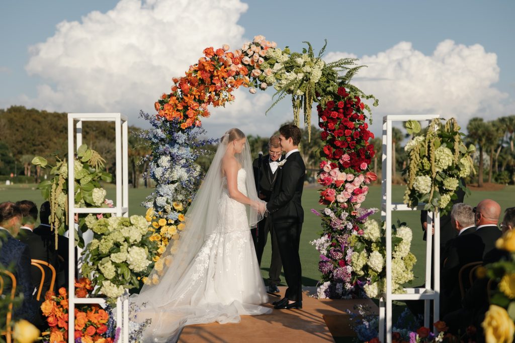 Colorful reception florals, TwinEagles Club wedding