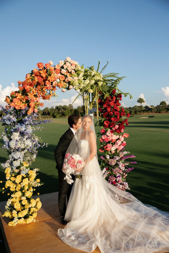Colorful reception florals, TwinEagles Club wedding